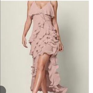 Beautiful dress, never worn. High low hem. Perfect for date night.